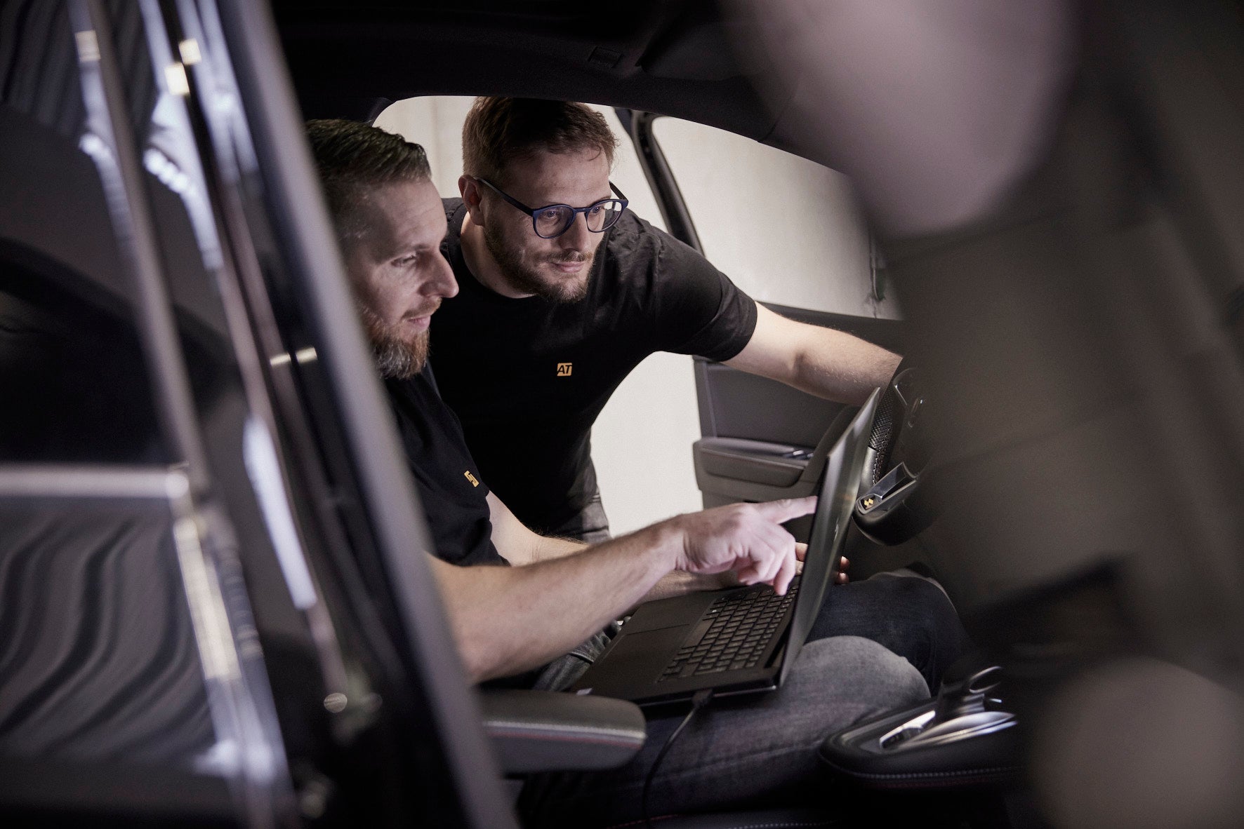 AutoTuner team working inside the car