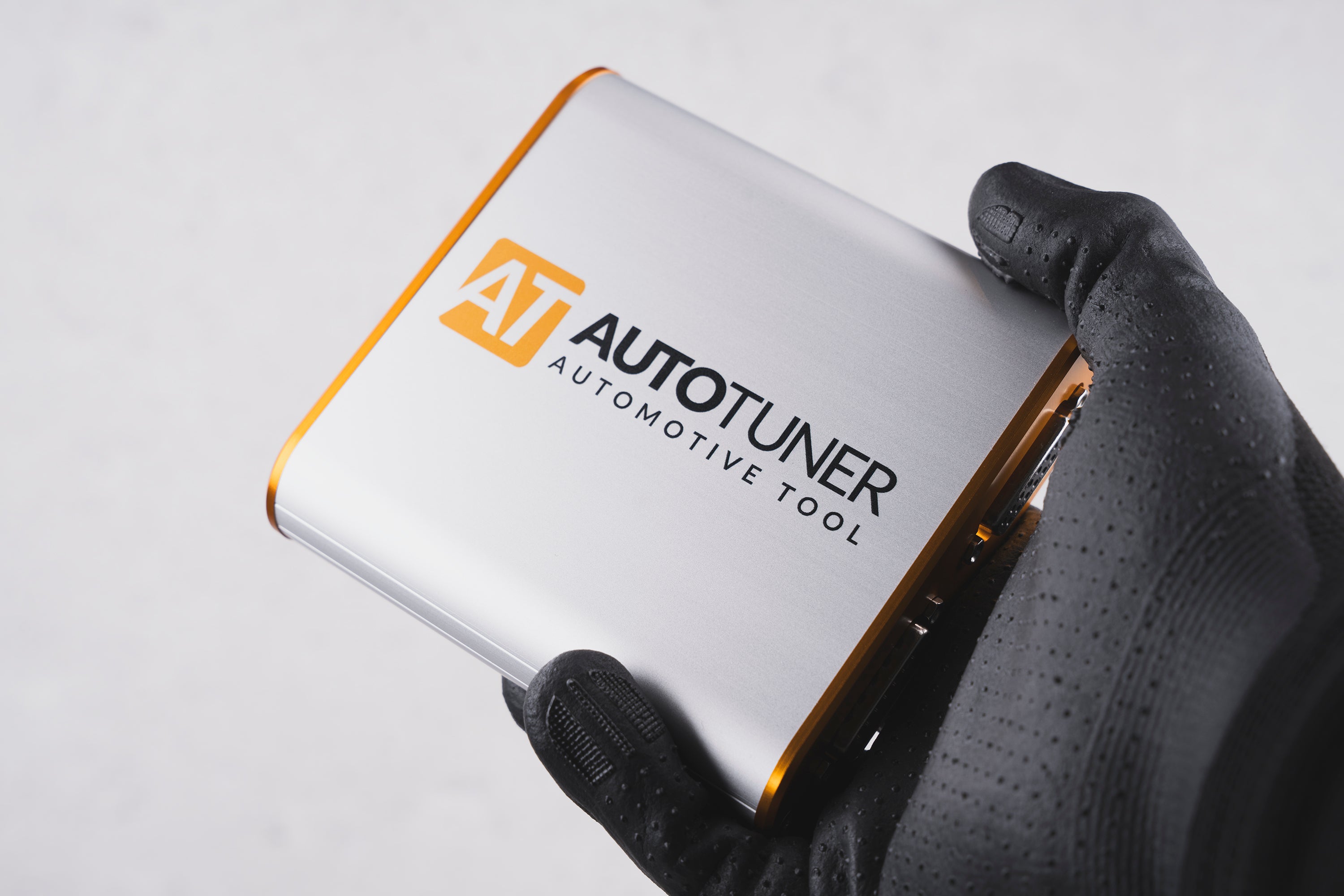 People handeling an autotuner 