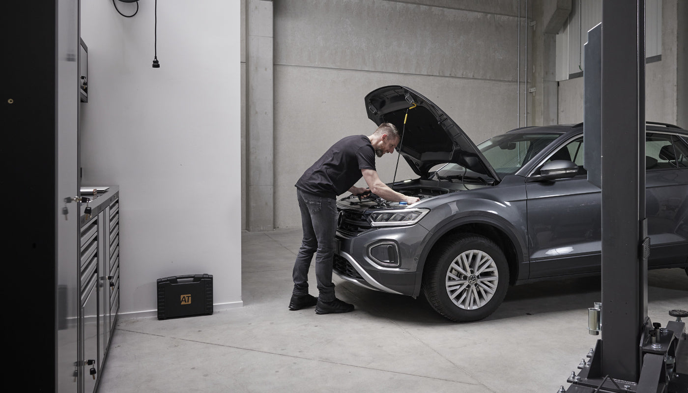 Garagist people working on a car with AutoTuner